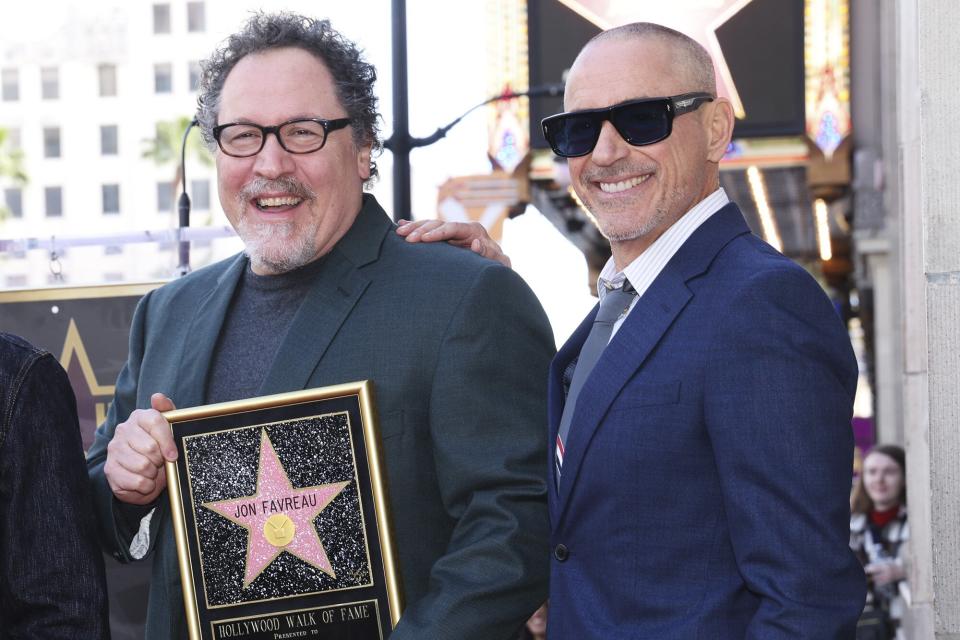 Jon Favreau, and Robert Downey Jr. attend The Hollywood Walk of Fame star ceremony honoring Jon Favreau on February 13, 2023 in Los Angeles, California.