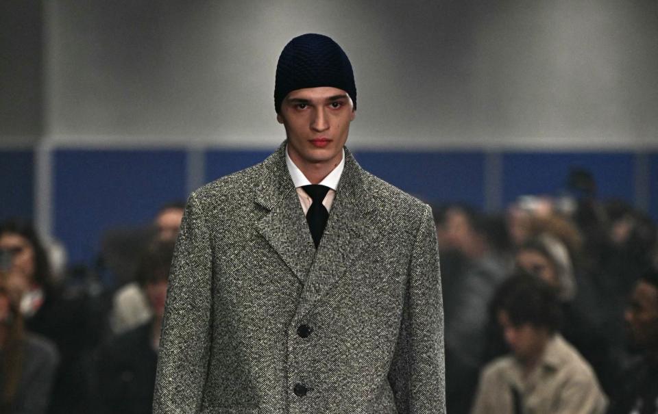 A model walks the runway at the Prada collection show during the Milan Fashion Week Menswear Autumn/Winter 2024/2025 on January 14, 2024 in Milan. (Photo by GABRIEL BOUYS / AFP) (Photo by GABRIEL BOUYS/AFP via Getty Images)