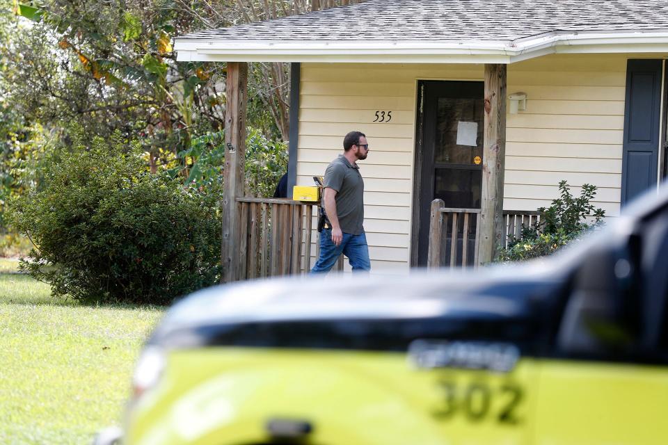 An investigator at the Buckhalter Road home where Quinton Simon was last seen on October 5, 2022.