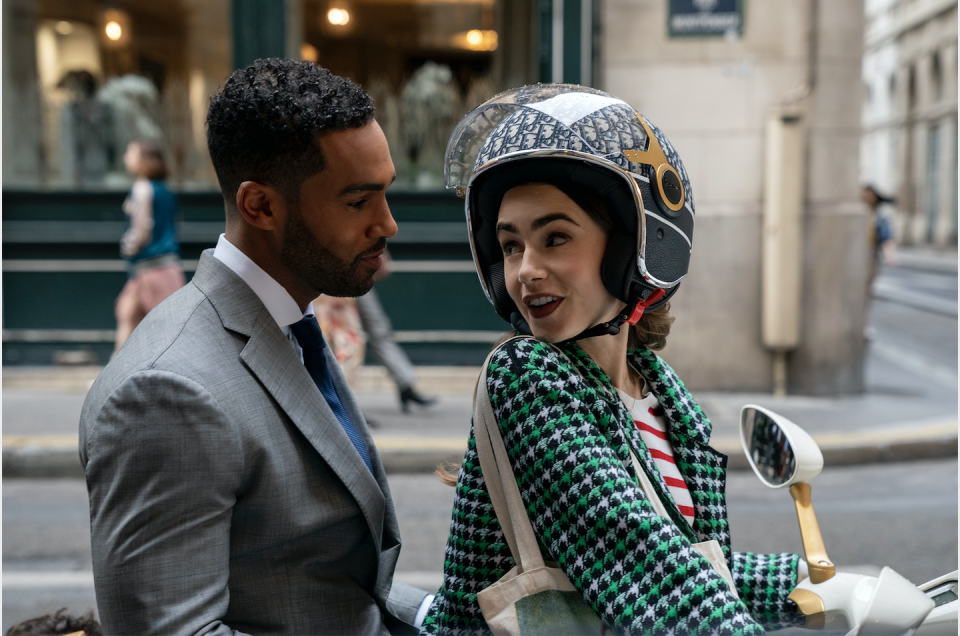 emily in paris scene on a vespa