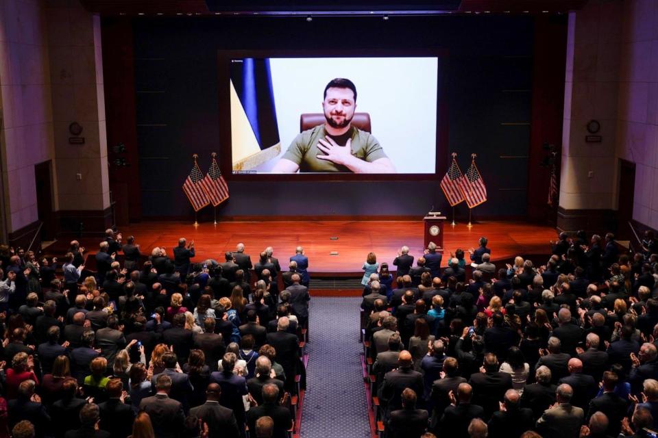 PHOTO: Ukrainian President Volodymyr Zelensky is seen on the screen delivering a speech via videoconference to the U.S. Congress at the Capitol in Washington, D.C., March 16, 2022.  (J. Scott Applewhite/Xinhua/Getty Images)