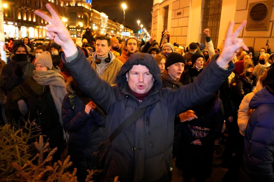 Demonstrators shout slogans in St. Petersburg, Russia, Thursday, Feb. 24, 2022.