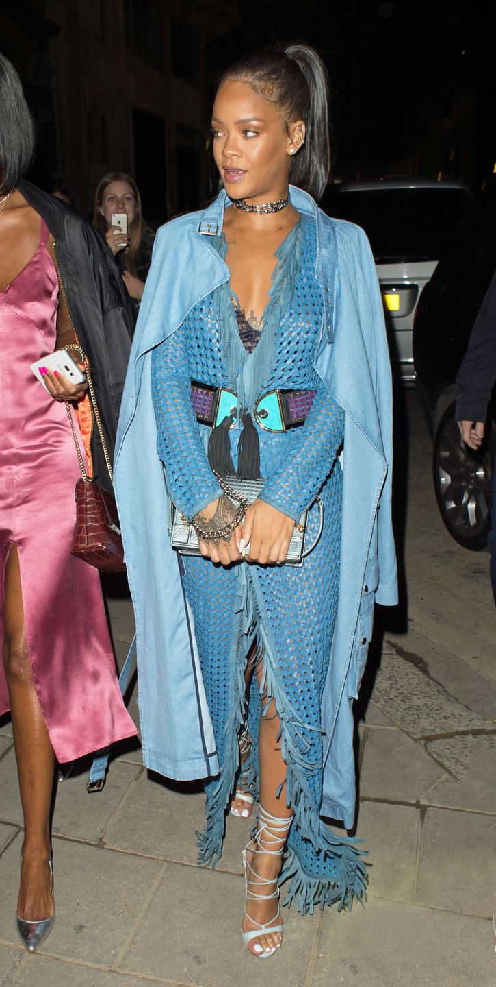 <p>Out in London with Drake (again) wearing a blue woven leather dress and denim jacket by Balmain. </p>