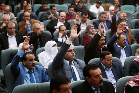 Members of the Jordanian parliament seen during an emergency meeting to discuss a potential announcement by the U.S. to move its embassy to Jerusalem, at the parliament in Amman, Jordan, December 6,2017. REUTERS/Muhammad Hamed