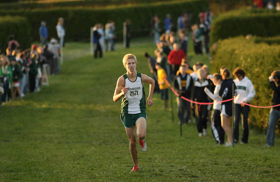 Ryan Lee of Archmere comes up the hill to finish the win at the 2009 New Castle County Championships at Winterthur Estate.