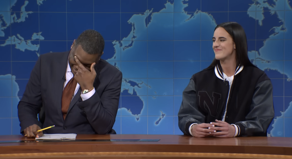 Closeup of Michael Che and Caitlin Clark on "SNL"