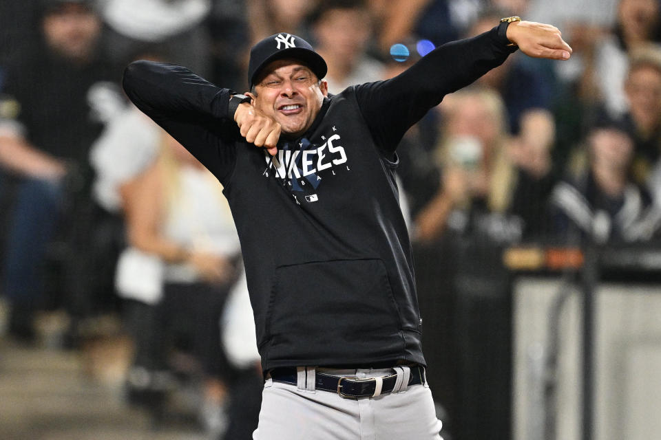 Aaron Boone let Laz Diaz know what he thought of his strike calls. (Jamie Sabau/Reuters)