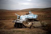An old tank can be seen near the Israeli settlement of Misho Edumim, in the occupied West Bank December 24, 2016. REUTERS/Amir Cohen