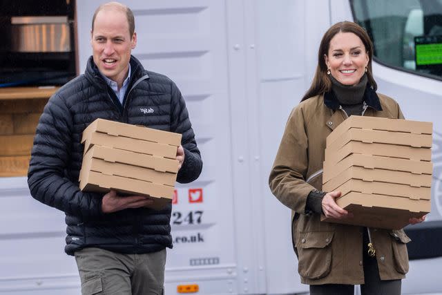 Mark Cuthbert/UK Press via Getty Prince William and Kate Middleton order pizza in Wales on April 27, 2023