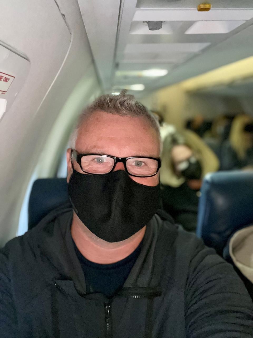 USA TODAY reporter Trevor Hughes on a United Express flight to Dulles International Airport on April 18, 2022.