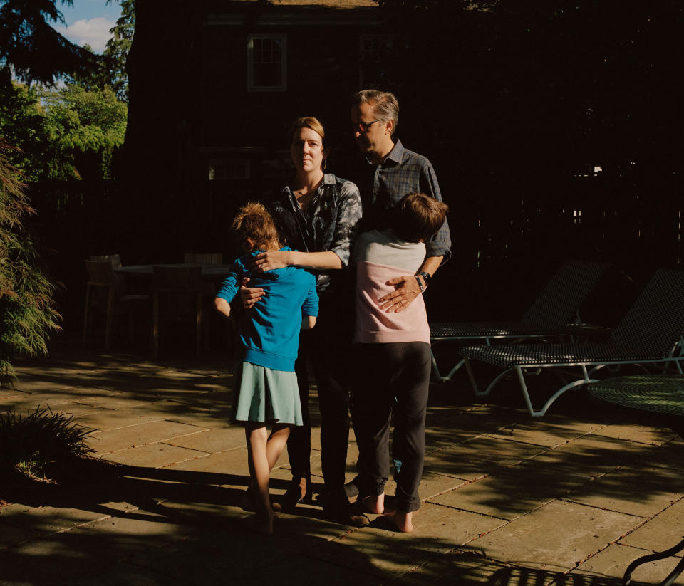 <strong>Karen and Chris with their kids at their new home in Portland, Ore. after leaving their home in Austin, Texas because of anti-trans state action.</strong> "<a href="https://time.com/6196617/trans-kids-texas-leave/" rel="nofollow noopener" target="_blank" data-ylk="slk:As Texas Targets Trans Youth, a Family Leaves in Search of a Better Future,;elm:context_link;itc:0;sec:content-canvas" class="link ">As Texas Targets Trans Youth, a Family Leaves in Search of a Better Future,</a>" July 14.<span class="copyright">Ricardo Nagaoka for TIME</span>