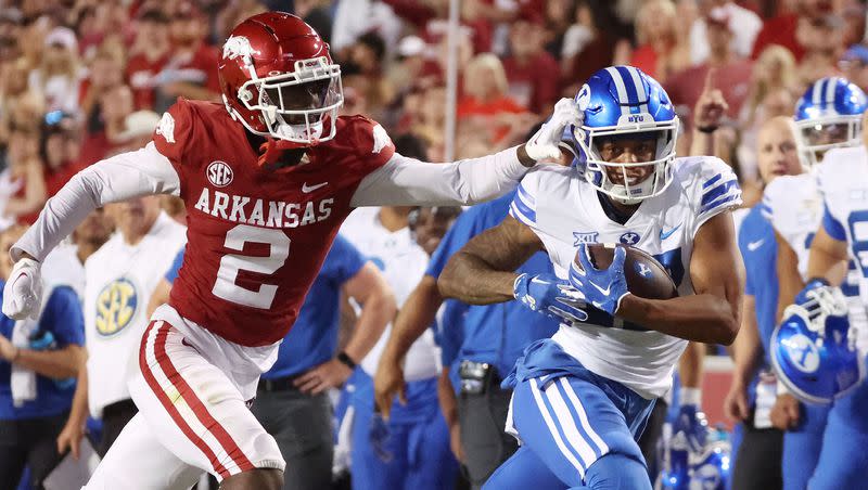 BYU receiver Keelan Marion runs for a big gain against Arkansas at Razorback Stadium in Fayetteville on Saturday, Sept. 16, 2023. BYU won 38-31, but there is work to do to get the Cougars’s offense clicking on all cylinders.