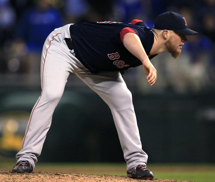 Red Sox closer Craig Kimbrel suffering a knee injury shagging fly balls in batting practice. (AP)