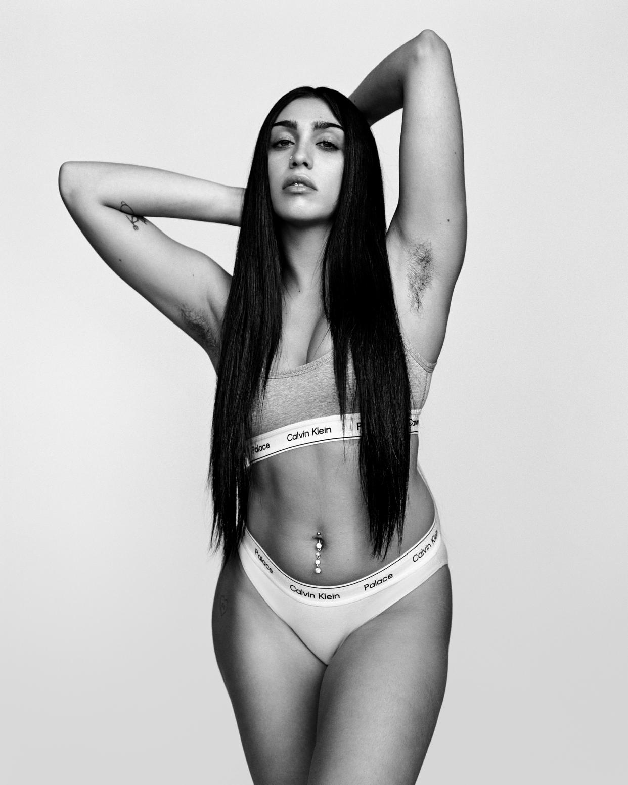 Lourdes Leon displays her arm pit hair in Calvin Klein's latest collection with Palace, CK1 Palace. (Photographed by Palace's Alasdair McLellan for Calvin Klein. Styled by Max Pearlman) 