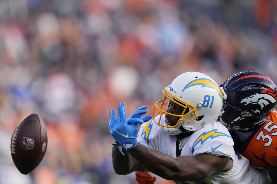 Denver Broncos cornerback Ja'Quan McMillian (35) breaks up a pass intended for Los Angeles Chargers wide receiver Mike Williams (81) during the first half of an NFL football game in Denver, Sunday, Jan. 8, 2023. (AP Photo/Jack Dempsey)