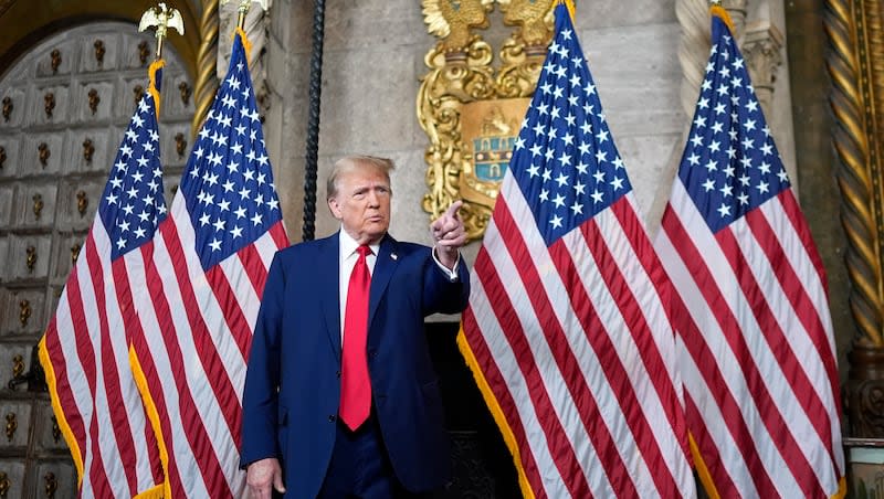 Republican presidential candidate former President Donald Trump points to a reporter for a question as he speaks at his Mar-a-Lago estate, Monday, March 4, 2024, in Palm Beach, Fla. The Supreme Court unanimously restored Trump to 2024 presidential primary ballots, rejecting state attempts to ban him over the Capitol riot. (AP Photo/Rebecca Blackwell)