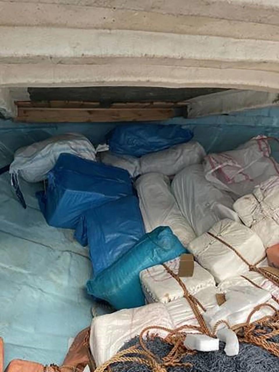 wrapped cargo packages aboard a dhow