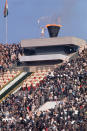 <p>The lit cauldron signifies the official start of the 18th Olympiad. </p>