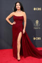 <p>in a strapless maroon ruched gown with thigh-high slit, paired with matching Christian Louboutin pumps and Lorraine Schwartz jewels.</p>