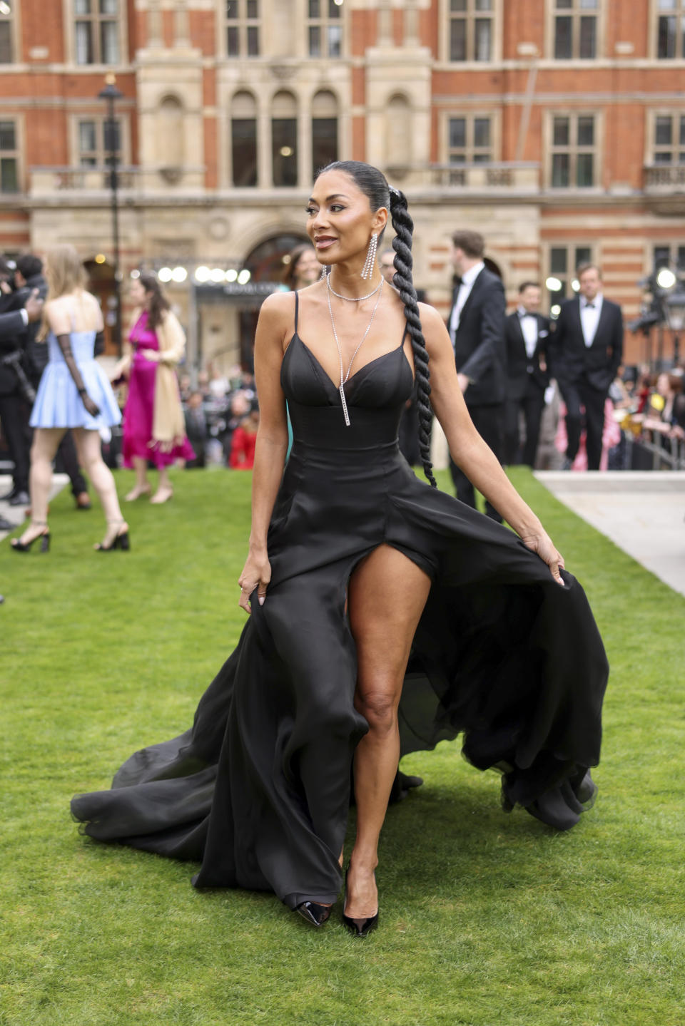 Nicole Scherzinger poses for photographers upon arrival at the Olivier Awards on Sunday, April 14, 2024, in London. (Photo by Vianney Le Caer/Invision/AP)