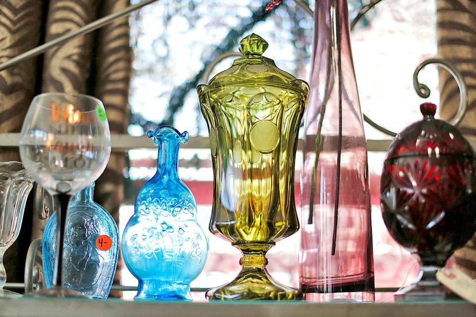 Colorful glassware at the Local Mystique thrift shop on Court Street in North Plymouth on Wednesday, July 27, 2022.