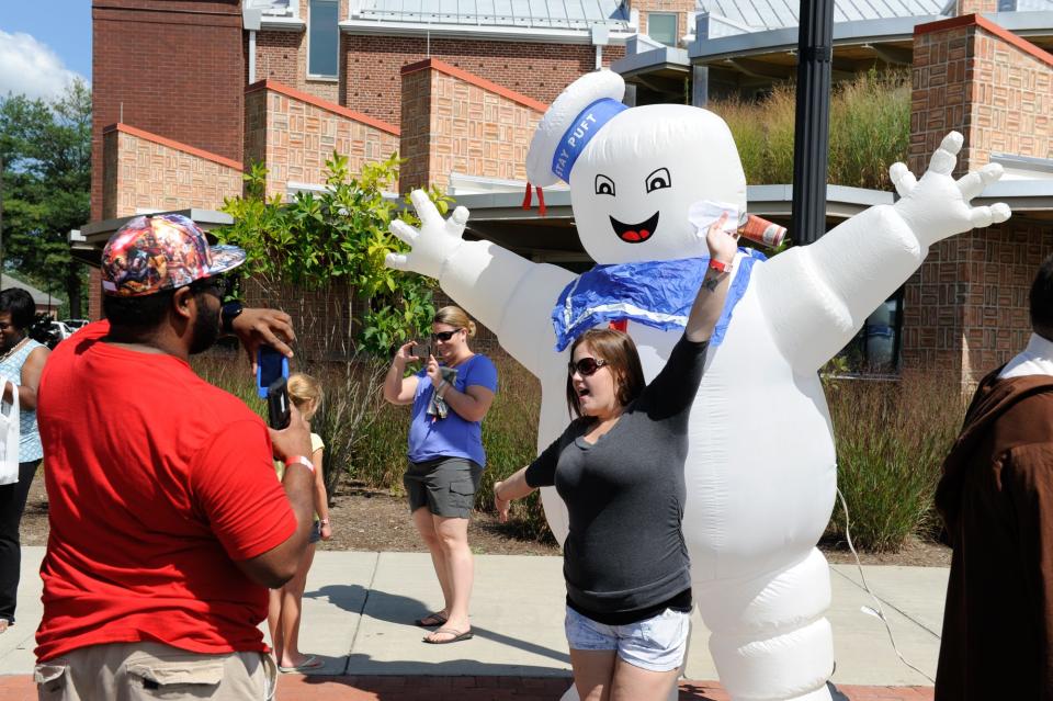 Lots of cosplayers will be on tap at Dover Comic Con on June 18. Pictured are con-goers taking photos in front of the Stay Puft Marshmallow Man at the Dover Comic Con on Aug. 8, 2015.