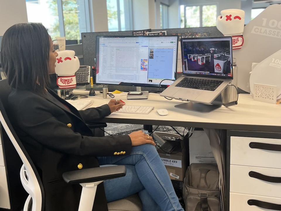 Rachelle Dejean working at her computer.