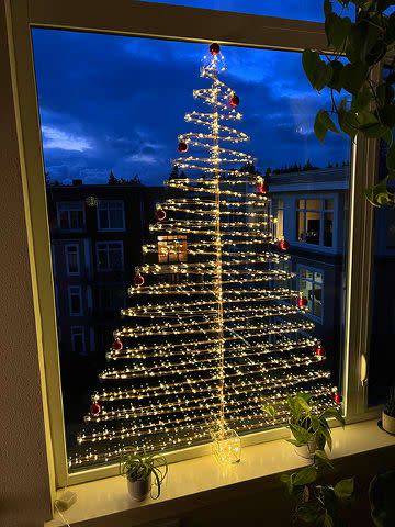 <p><a href="https://www.thebudgetdecorator.com/minimal-modern-diy-wall-christmas-tree-for-windows-too/" data-component="link" data-source="inlineLink" data-type="externalLink" data-ordinal="1">The Budget Decorator</a></p>