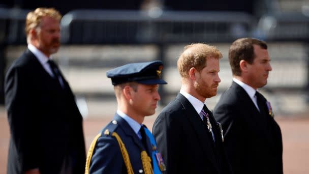 PHOTO: William, Prince of Wales and Prince Harry march during a procession where the coffin of Britain's Queen Elizabeth is transported from Buckingham Palace to the Houses of Parliament for her lying in state, in London, Sept. 14, 2022. (Sarah Meyssonnier/Reuters)