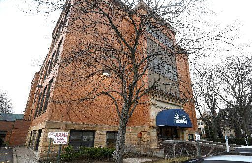 The Erie School District is taking bids for the purchase of its administration building at West 21st and Sassafras streets as the central offices prepare to move into a newer building two blocks north.