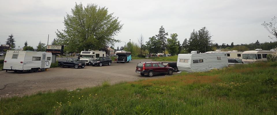 Travel trailers, RV's and cars sit on the county public works' property just off Poplars Avenue NW, near the Haselwood YMCA in Silverdale on Thursday. County homeless responders are working with those living in the vehicles to find shelter elsewhere.