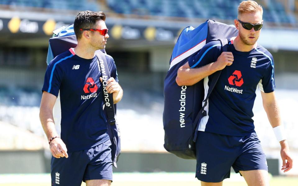 James Anderson and Stuart Broad walk to the nets - PA