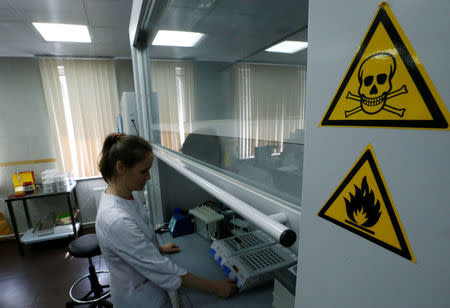 Technician Natalia Bochkaryova works at the Russian anti-doping laboratory in Moscow, Russia, May 24, 2016. REUTERS/Sergei Karpukhin