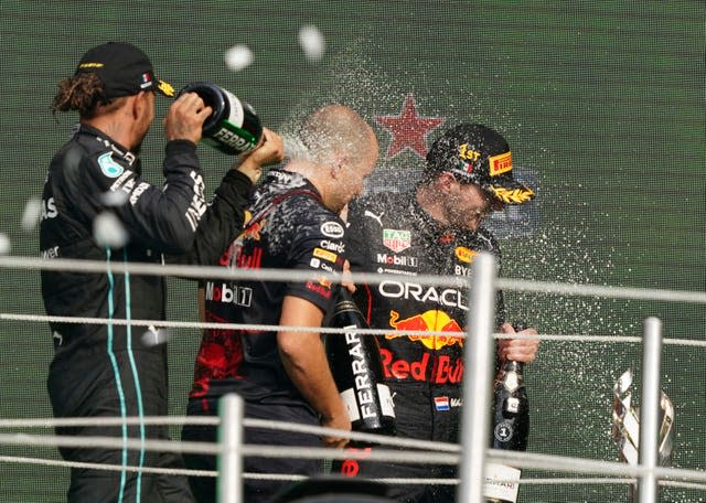 Lewis Hamilton sprays champagne