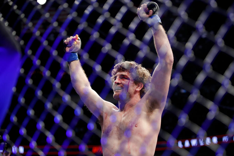 Ben Askren celebrates after defeating Robbie Lawler in a welterweight mixed martial arts bout at UFC 235, Saturday, March 2, 2019, in Las Vegas. (AP Photo/John Locher)