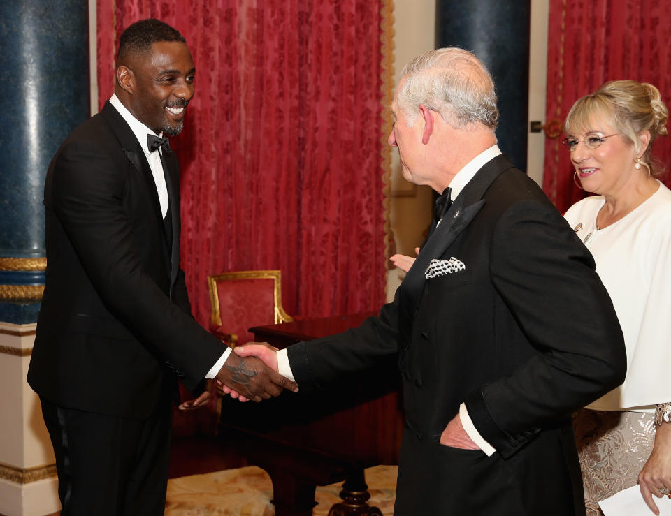 LONDON, ENGLAND - DECEMBER 14:  Prince Charles, Prince of Wales chats to actor Idris Elba  as he hosts the 'One Million Young Lives' dinner at Buckingham Palace on December 14, 2017 in London, England.  (Photo by Chris Jackson/Getty Images)