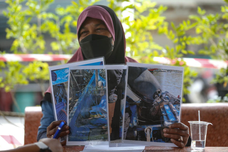 Fajinah Jaafar, 60, speaks to Malay Mail regarding the Penang South Reclamation project that was put on halt at Gertak Sanggul in Penang, September 13, 2021.