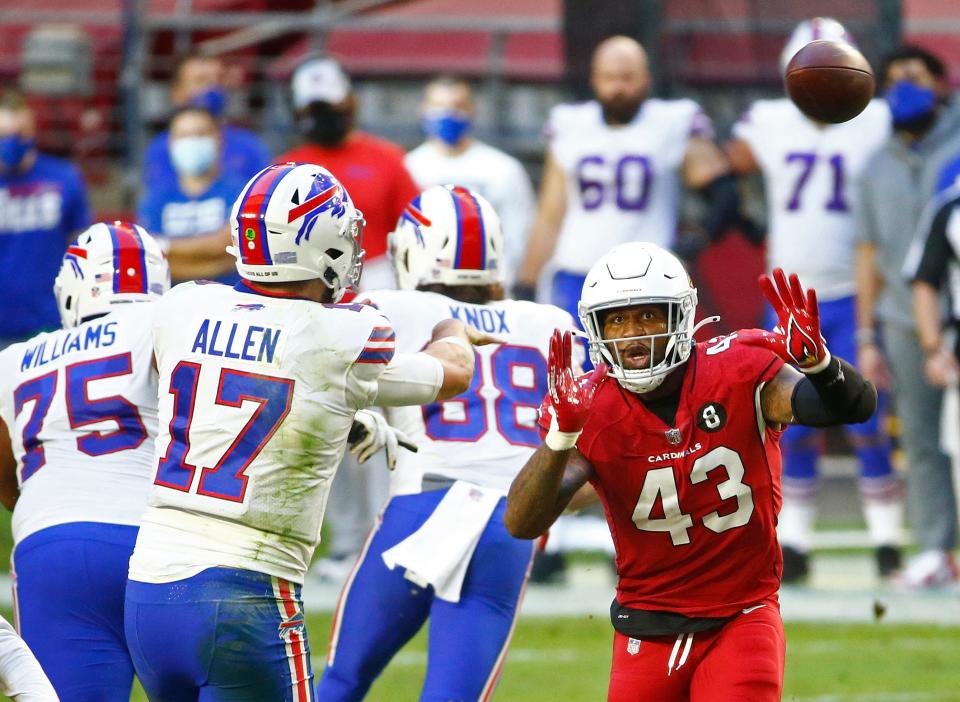 Cardinals' Haason Reddick (43) forces a pass on Bills' Josh Allen (17) during the third quarter at State Farm Stadium in Glendale, Ariz. on Nov. 15, 2020. 