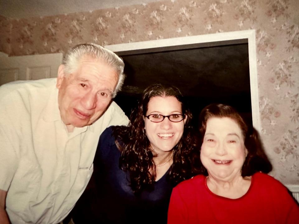 Courier Journal Features and Business Editor Kathryn Gregory, center, with her grandparents, Frank and Madeline Amendola.