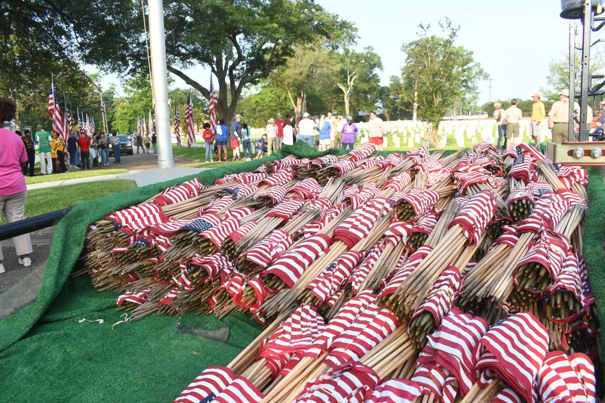 The Alexandria VA Medical Center is inviting the public to help place flags on the 7,816 graves Saturday at the Alexandria National Cemetery. The event is part of an annual community tradition, according to a press release issued by the Alexandria VA.