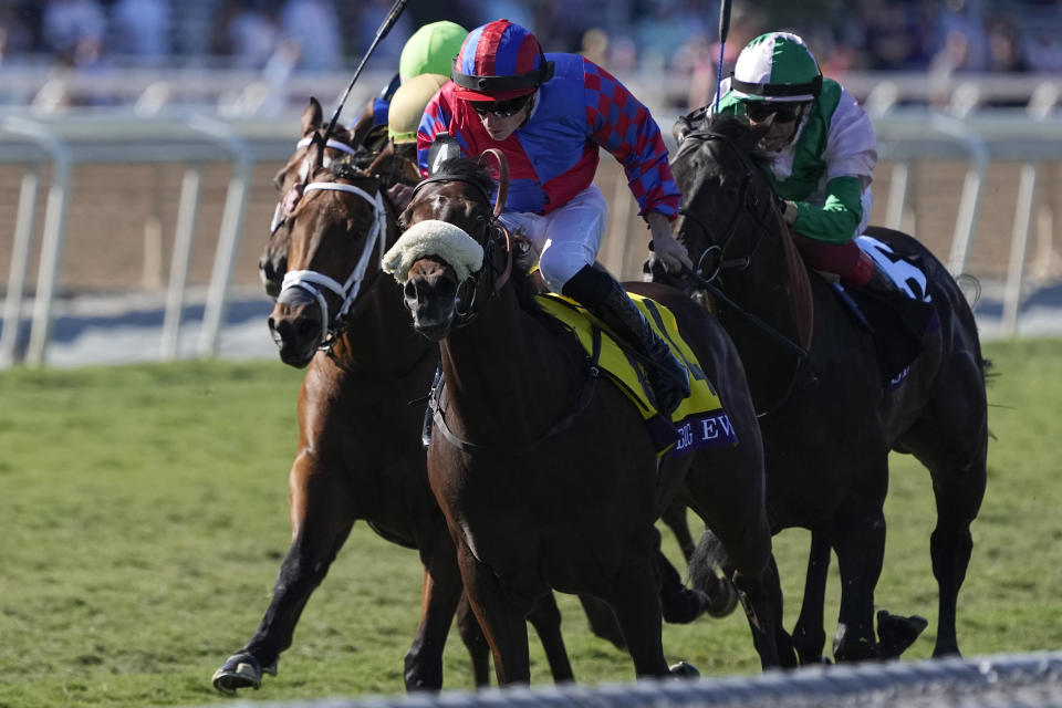 Tom Marquand rides Big Evs, center, to win the Breeders' Cup Juvenile Turf Sprint horse race Friday, Nov. 3, 2023 at Santa Anita Park in Arcadia, Calif. (AP Photo/Mark J. Terrill)