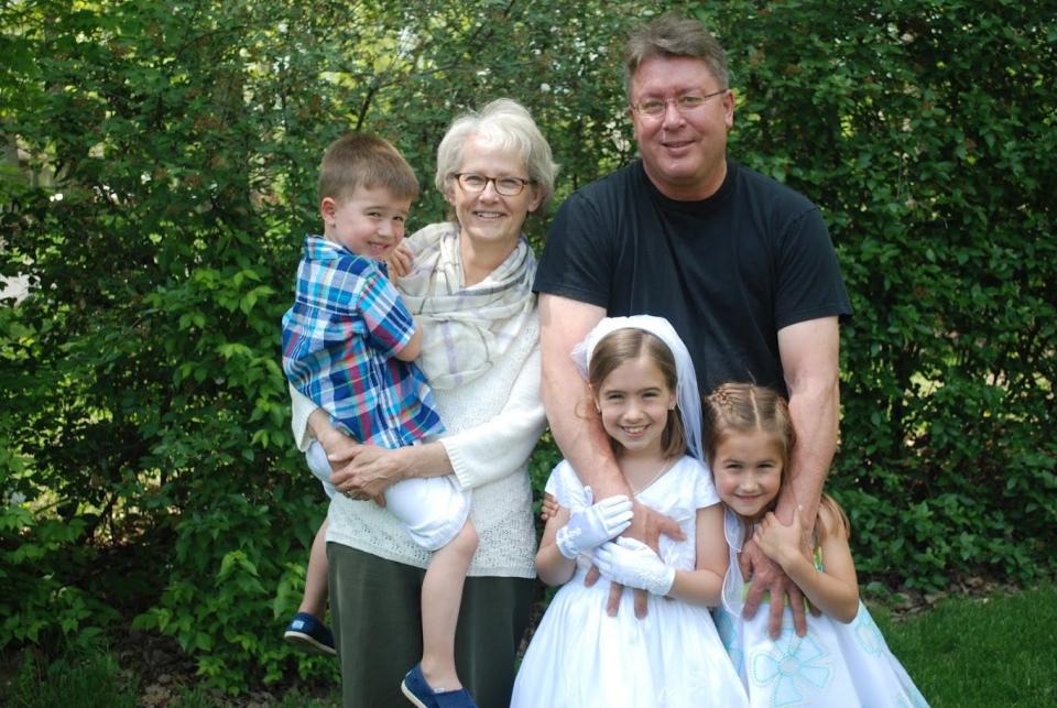 Grace Schoonveld with husband Brian and three grandchildren, Cameron Christopher (Grace holding), Emily Grace, middle and Addison Meril.