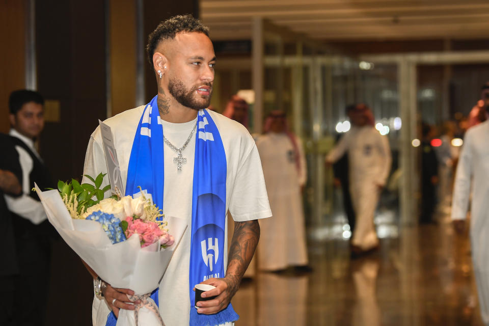 Brazilian national team's historical top scorer and the star of Paris Saint-Germain, Neymar Jr. arrives at King Khalid International Airport in Riyadh, Saudi Arabia, Friday, Aug. 18, 2023. Saudi Al Hilal club reached an agreement on the transfer of the Brazil forward for a reported 90 million euros ($98 million), a record for a league that is now financially backed by the oil-rich state. (AP Photo)
