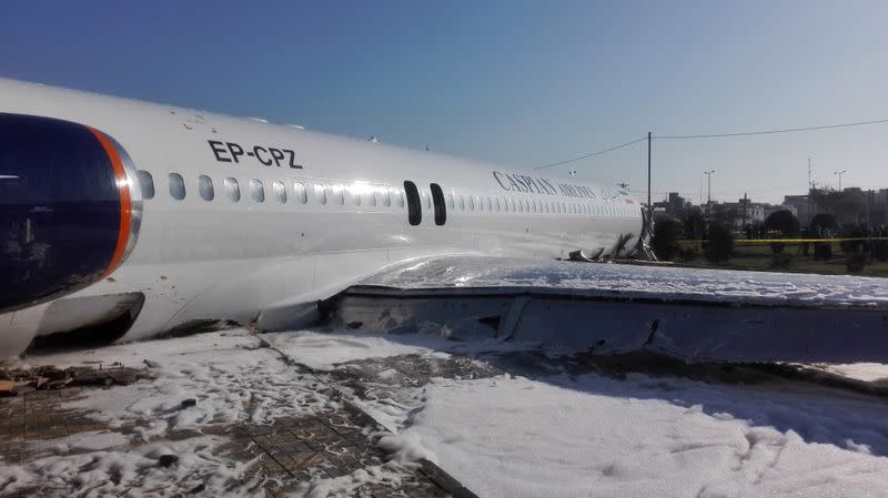 Iranian passenger plane is seen after sliding off the runway upon landing at Mahshahr airport