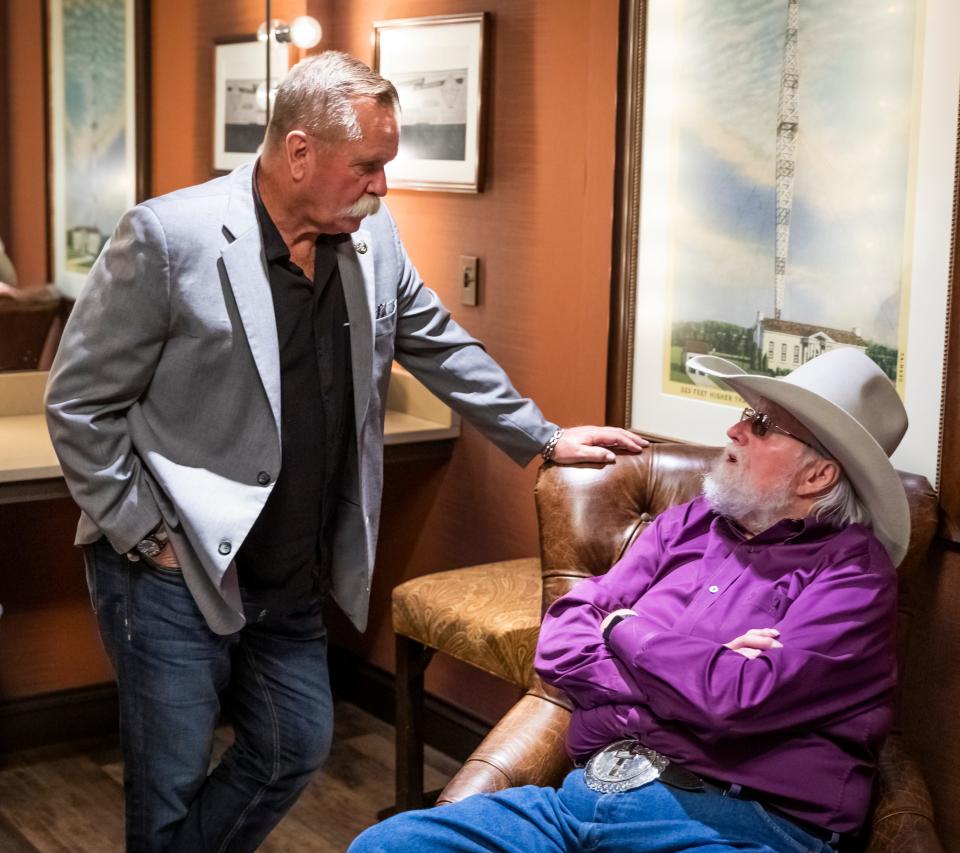 David Corlew, left, chats with Charlie Daniels backstage at the Grand Ole Opry House Tuesday, October 15, 2019.