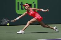 Mar 24, 2018; Key Biscayne, FL, USA; Agnieszka Radwanska of Poland reaches for a forehand against Simona Halep of Romania (not pictured) on day five of the Miami Open at Tennis Center at Crandon Park. Radwanska won 3-6, 6-2, 6-3. Mandatory Credit: Geoff Burke-USA TODAY Sports