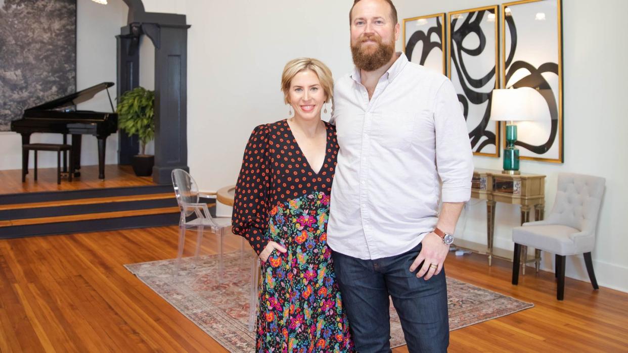 erin and ben in the glamorous living space at the thrower residence on reveal day