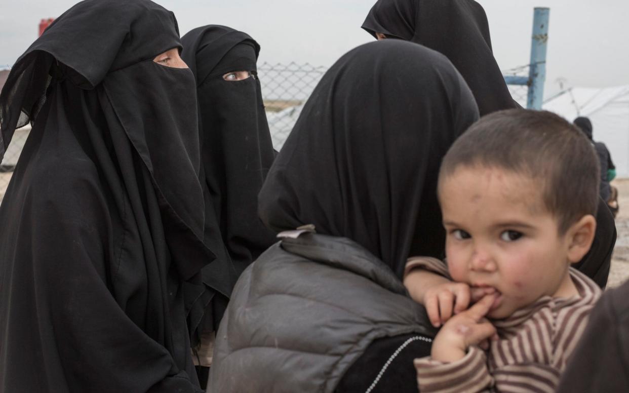 Women gather in the section for foreign families at the al-Hol, near Hasakeh in Syria – a camp which is now home to those who are displaced after living under the Islamic State - The Telegraph