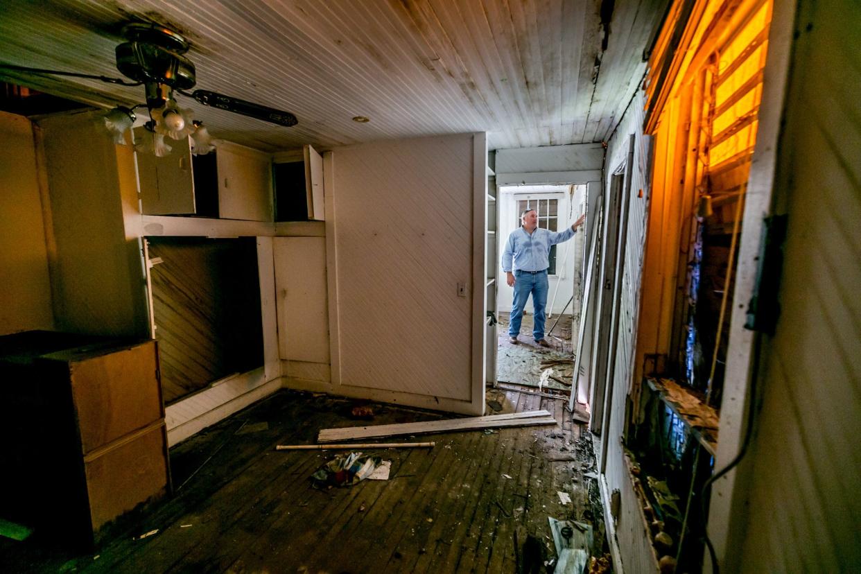 The Dubois Pioneer Home is turning 125 years old. In this photo from June 2019, Palm Beach County Director of Park Development Bob Hamilton stands inside the historic Pineapple Packing House at DuBois Park in Jupiter.