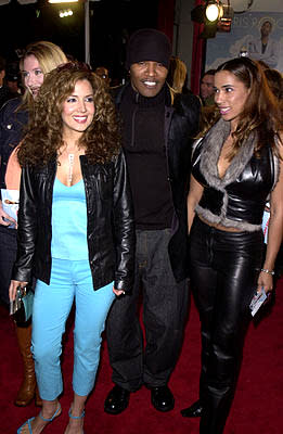 Jamie Foxx and two seriously fly girls at the Hollywood premiere of Paramount's Down To Earth